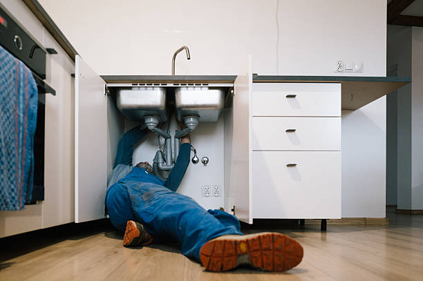 Professional Drain Cleaning technician working in Livingston, IL
